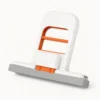 Mini sponge mop standing upright on a countertop