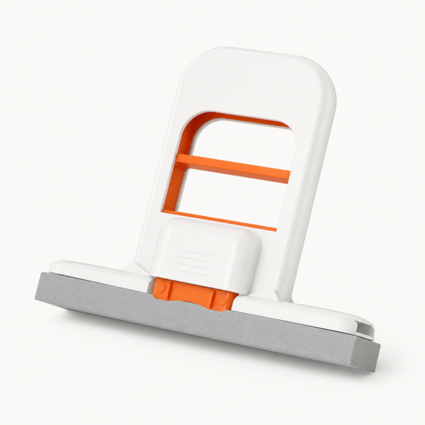 Mini sponge mop standing upright on a countertop