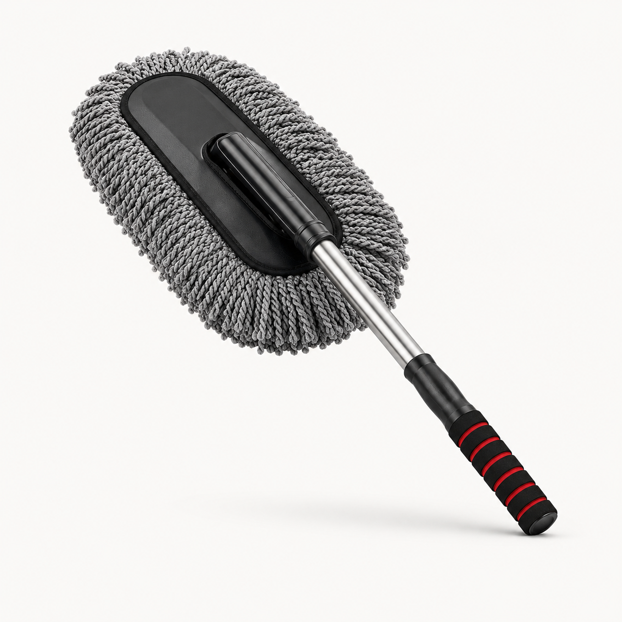 Microfiber car duster cleaning the hood of a car