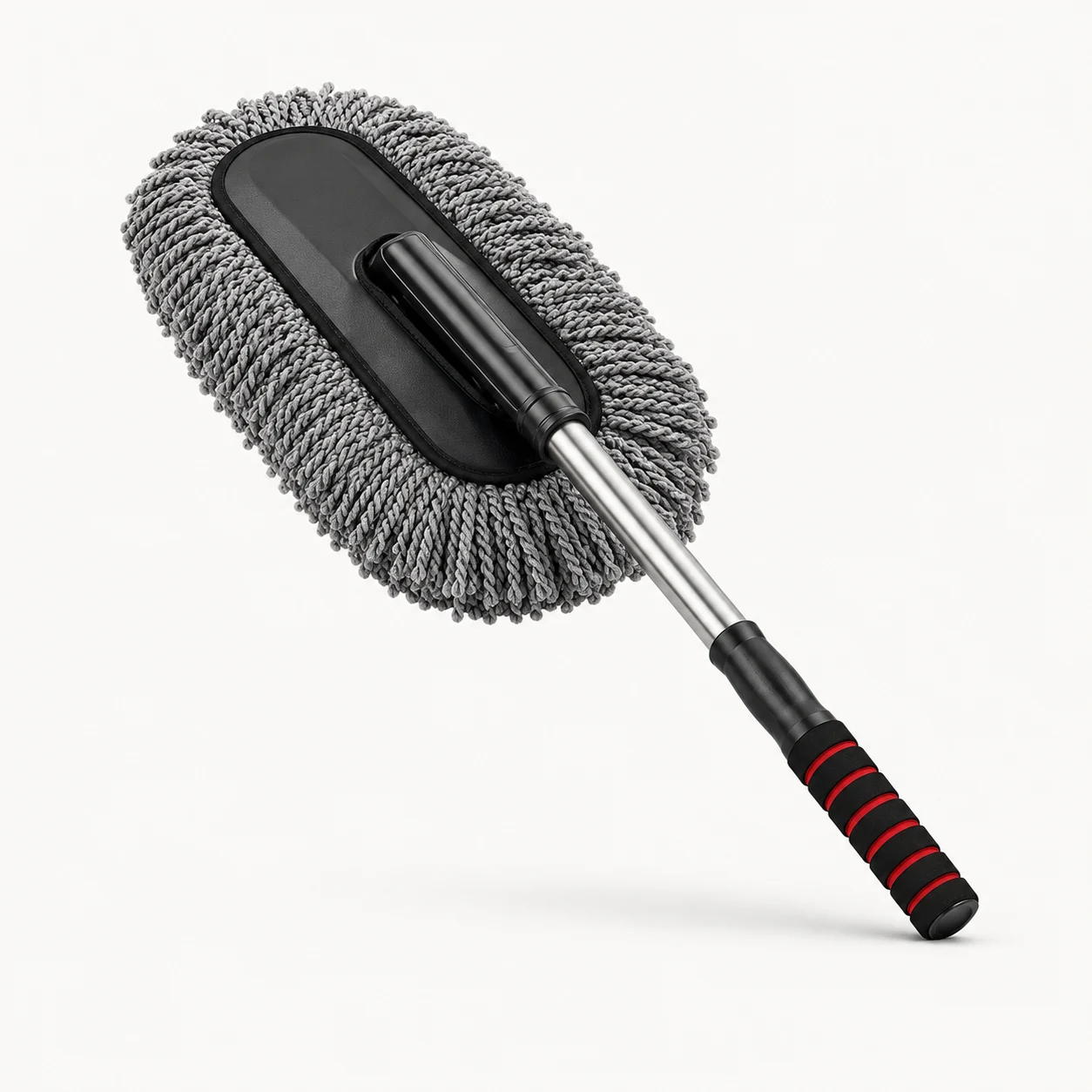 Microfiber car duster cleaning the hood of a car