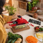 Close-up of 10 in 1 vegetable cutter blade slicing carrots