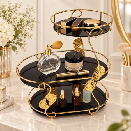 3 tier round black and gold makeup organizer holding cosmetics, jewelry and perfume