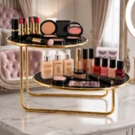 Top view of offset golden 2 tier vanity storage rack with makeup and cosmetics